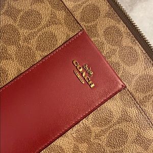 COACH saddle bag. NWOT Beige/pink in color